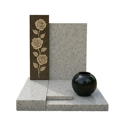 Monument funéraire moderne en granit clair sculpté de motifs de roses